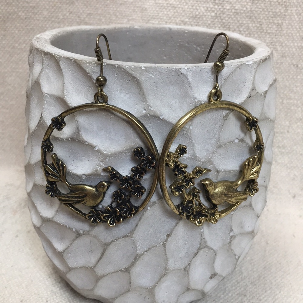 Antique bronze bird on flower branch earrings